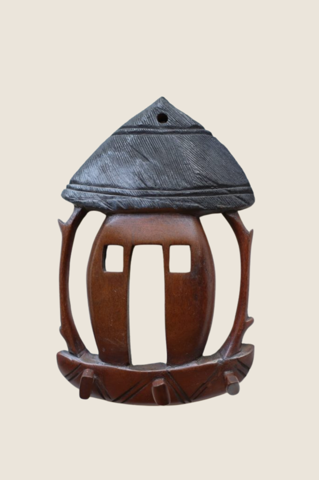 Drewniany afrykański wieszak